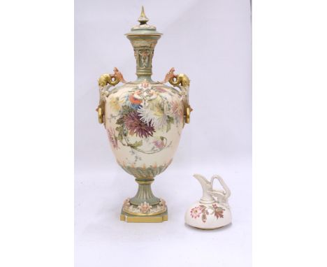 A ROYAL WORCESTER PORCELAIN VASE OF BALUSTER FORM WITH DRAGON HANDLES (HAS BEEN RESTORED) TOGETHER WITH A ROYAL WORCESTER DRA