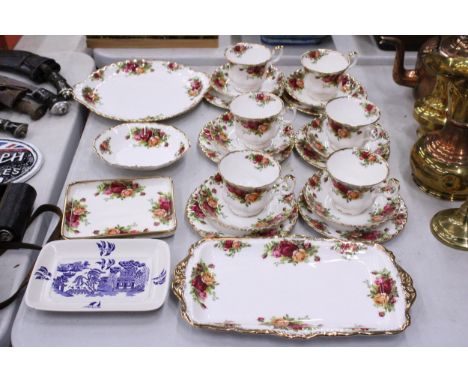 A QUANTITY OF ROYAL ALBERT OLD COUNTRY ROSES TO INCLUDE CAKE PLATE, TEACUPS, SAUCERS, SIDE PLATES, ETC., (FIRST QUALITY)