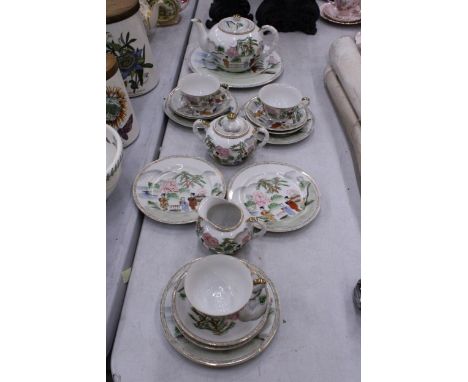 A JAPANESE KUTANI STYLE TEASET WITH GEISHA GIRL LIPOTHANE TO INCLUDE A TEAPOT