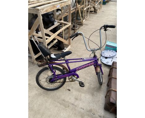 A PURPLE MKIII RALEIGH CHOPPER BIKE