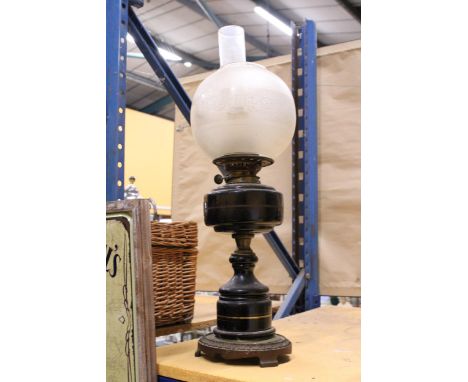 A LARGE VINTAGE OIL LAMP WITH SHADE