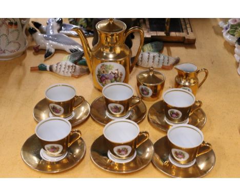 A VINTAGE BONDWARE PORCELAIN GOLD TEASET DEPICTING COURTING COUPLES