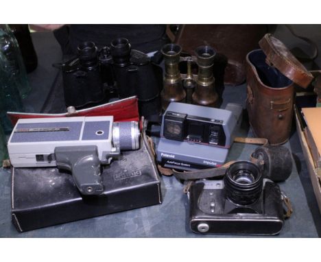 A QUANTITY OF VINTAGE CAMERAS TO INCLUDE A ZENIT-E, POLAROID IMPULSE, EUMIG SUPER CINE CAMERA, TWO PAIRS OF CASED BINOCULARS,