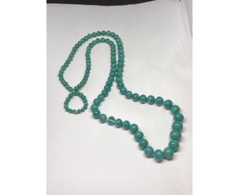 A POSSIBLY JADE NECKLACE (ONE BEAD A/F)