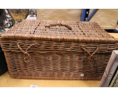 A LARGE WICKER HAMPER