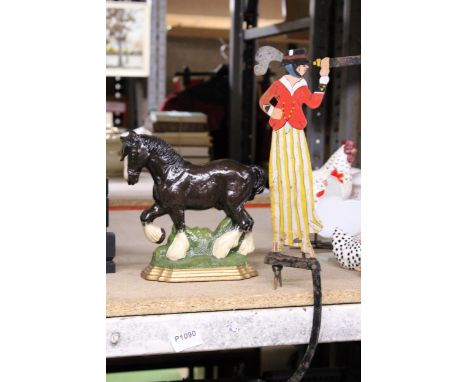 A CAST SHIRE HORSE DOORSTOP AND A VINTAGE METAL PART OF A WEATHER VANE