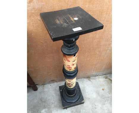 AN EBONISED PLANT STAND WITH CERAMIC COLUMN (A/F)