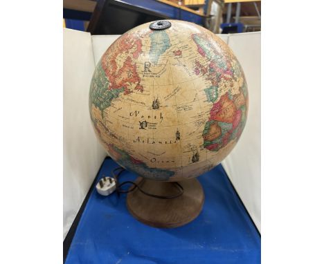 A VINTAGE DANISH SCAN LIGHT UP GLOBE ILLUMINATED WITH INNER PIN POINT LIGHT