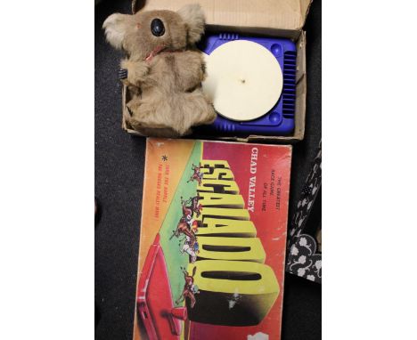 A VINTAGE BOXED CHAD VALLEY ESCALADO HORSE RACING GAME, A BOXED VINTAGE LUMAR TOY GRAMOPHONE AND A VINTAGE KOALA BEAR