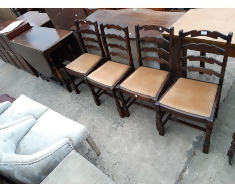 AN OVAL GATE LEG DINING TABLE, 60" X 42" OPENED ON TURNED LEGS AND FOUR LADDER BACK DINING CHAIRS