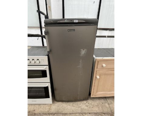 A GREY HOTPOINT UPRIGHT FRIDGE