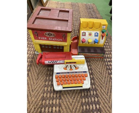 THREE PRE-SCHOOL CHILDREN'S TOYS TO INCLUDE A FIRE STATION, CASH REGISTER AND TYPEWRITER