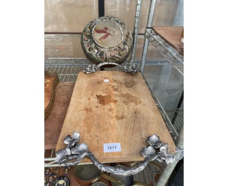 A WOODEN TRAY WITH TWIN CARRYING HANDLES AND A TAPESTRY STOOL