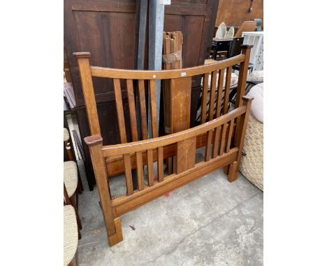 AN EDWARDIAN MAHOGANY AND INLAID 4'6" BEDSTEAD