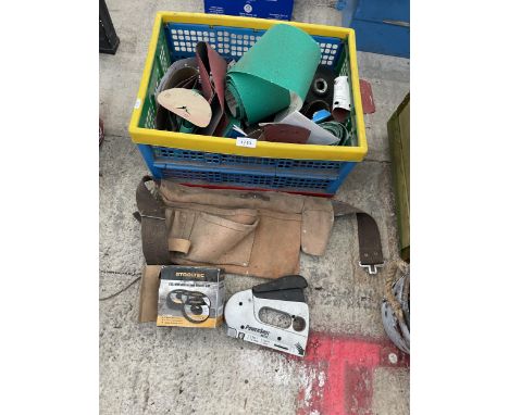 AN ASSORTMENT OF ITEMS TO INCLUDE SANDPAPER, A TOOL BELT AND GRINDING DISCS ETC