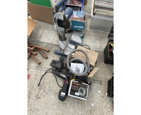 AN ASSORTMENT OF TOOLS TO INCLUDE A POWER CRAFT MITRE SAW, AN AIR COMPRESSOR AND A DRILL ETC