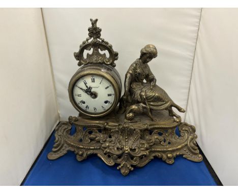 A DECORATIVE GILT BRONZE 20TH CENTURY GERMAN MANTLE CLOCK WITH WHITE ENAMEL DIAL MARKED IMPERIAL AND ROMAN NUMERALS NEXT TO A