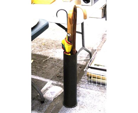 A STICK STAND TO INCLUDE UMBRELLAS AND WALKING STICKS