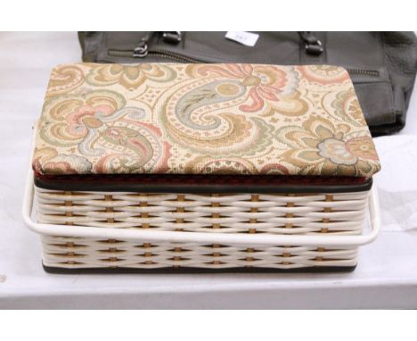 A VINTAGE SEWING BASKET WITH CONTENTS