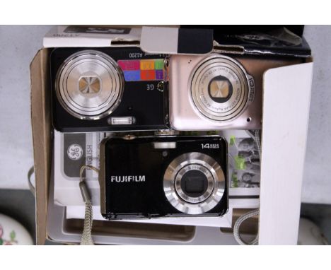 THREE CAMERAS TO INCLUDE A BOXED A1200 DIGITAL CAMERA, A KODAK V1003 AND A FUJIFILM AV150