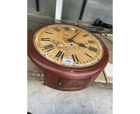 A VINTAGE WOODEN CASED CIRCULAR WALL CLOCK