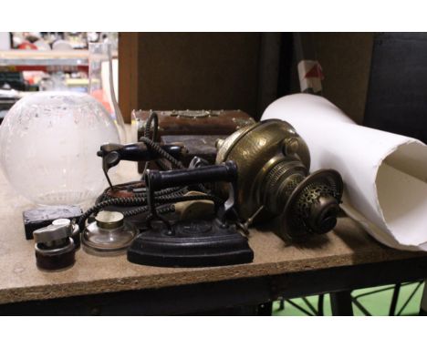 A QUANTITY OF VINTAGE ITEMS TO INCLUDE VINTAGE IRONS, BOXES, AN OIL LAMP (IN NEED OF RE-BUILDING), INKWELLS, ETC