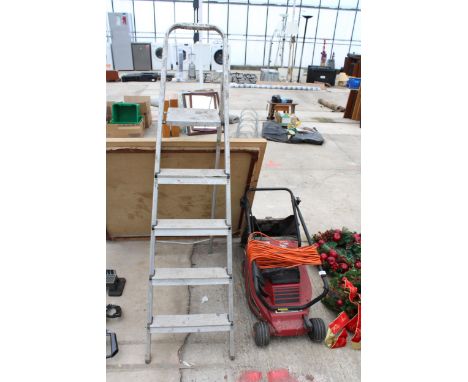 A MOUNTFIELD ELECTRIC LAWN MOWER WITH GRASS BOX AND A FOUR RUNG STEP LADDER