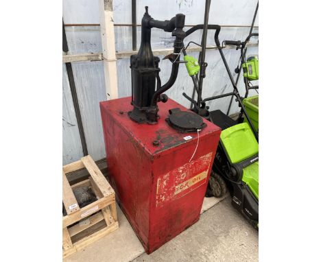 A VINTAGE ESSOLUBE OIL TANK AND PUMP