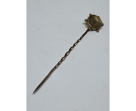 A 9 CARAT GOLD STICK PIN GROSS WEIGHT 0.61 GRAMS