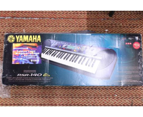 A YAMAHA PSR-140 KEYBOARD - BOXED