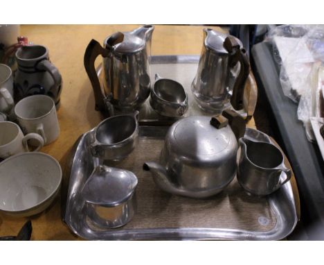 A QUANTITY OF VINTAGE PICQUOT WARE TO INCLUDE TWO TRAYS, COFFEE POTS, TEAPOT, SUGAR BOWLS AND A CREAM JUG