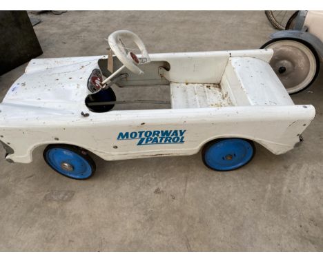 A VINTAGE TRIANG MOTORWAY PATROL PEDAL CAR