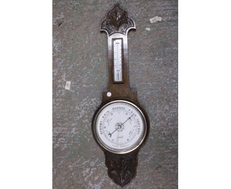 AN OAK CASED ANEROID BAROMETER WITH THERMOMETER, HEIGHT 82CM