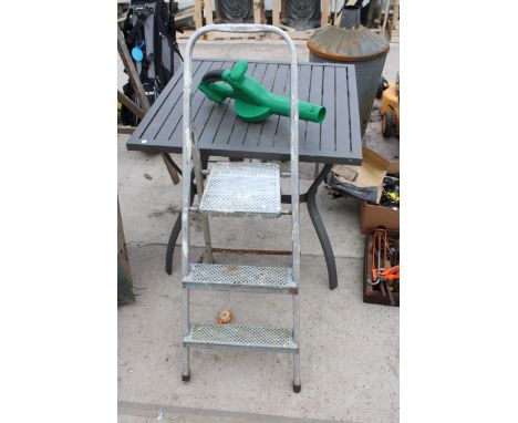 A GARDEN TABLE, A TWO RUNG STEP LADDER AND A BATTERY LEAF BLOWER BODY