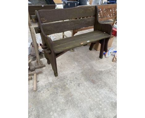 A VINTAGE WOODEN TWO SEATER GARDEN BENCH