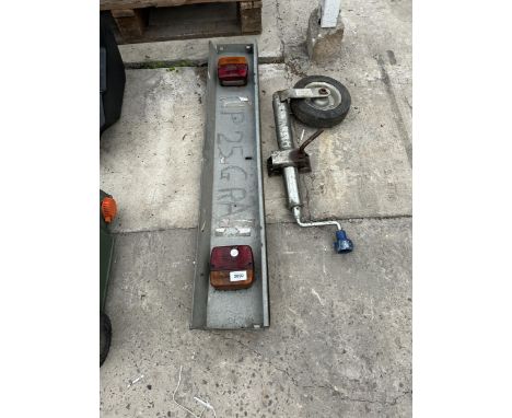 A TRAILER LIGHT BOARD AND A JOCKEY WHEEL