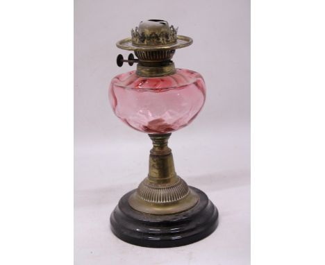 A CRANBERRY AND BRASS OIL LAMP BASE