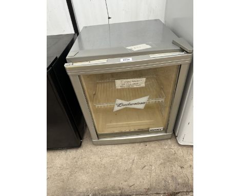 A GREY COUNTERTOP BUDWEISER BOTTLE FRIDGE