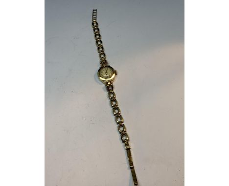 A ROTARY LADIES WRIST WATCH WITH MARKED 9 CARAT GOLD CASE AND GOLD PLATED STRAP