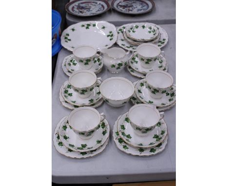 A COLCLOUGH, IVY LEAF PATTERNED TEASET TO INCLUDE CAKE PLATES, A SUGAR BOWL, CREAM JUG, CUPS, SAUCERS AND SIDE PLATES