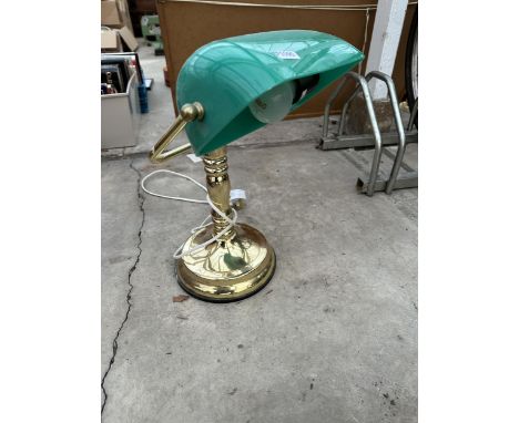 A BRASS BANKERS LAMP WITH GREEN GLASS SHADE