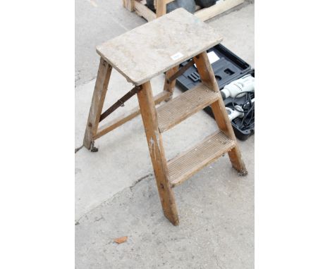 A VINTAGE WOODEN TWO RUNG STEP LADDER