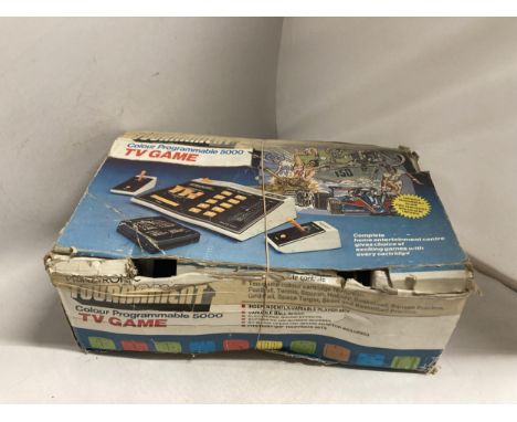 A BOXED VINTAGE 1980'S PRINZTRONIC TOURNAMENT TV ARCADE/VIDEO GAME CONSOLE AND GAMES