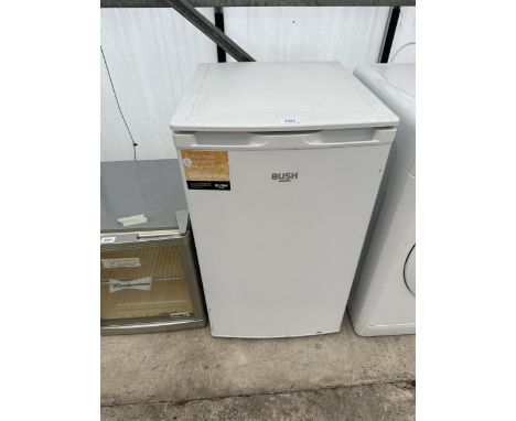 A WHITE BUSH UNDERCOUNTER FRIDGE