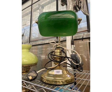 A VINTAGE BRASS BANKERS LAMP WITH A GREEN GLASS SHADE