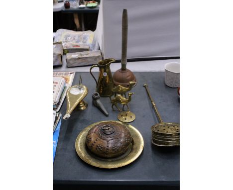 A QUANTITY OF BRASSWARE TO INCLUDE A CHESTNUT ROASTER, A POSSER, CAMELS, JUG, ALADDIN LAMP, ETC