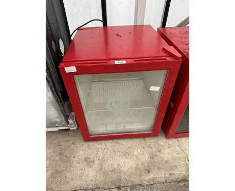 A RED HUSKY LFC BOTTLE FRIDGE