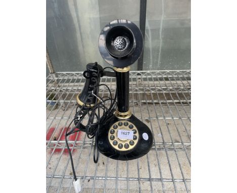 A VINTAGE STYLE PUSH BUTTON STICK TELEPHONE