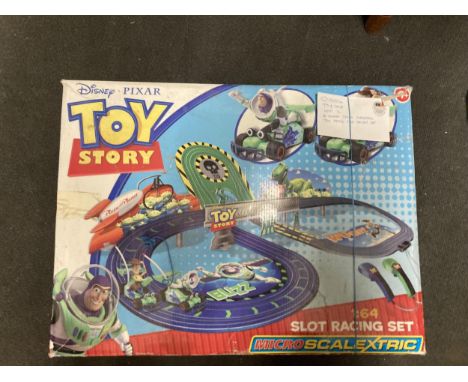 A BOXED TOY STORY MICRO SCALEXTRIC SLOT RACING SET