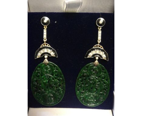 Pair of silver &amp; gold drop earrings set with large oval patterned jade, diamonds &amp; black enamel 